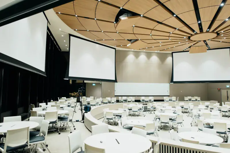A large conference hall set up for a corporate event