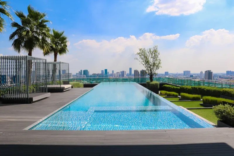 A rooftop infinity pool overlooking the city skyline